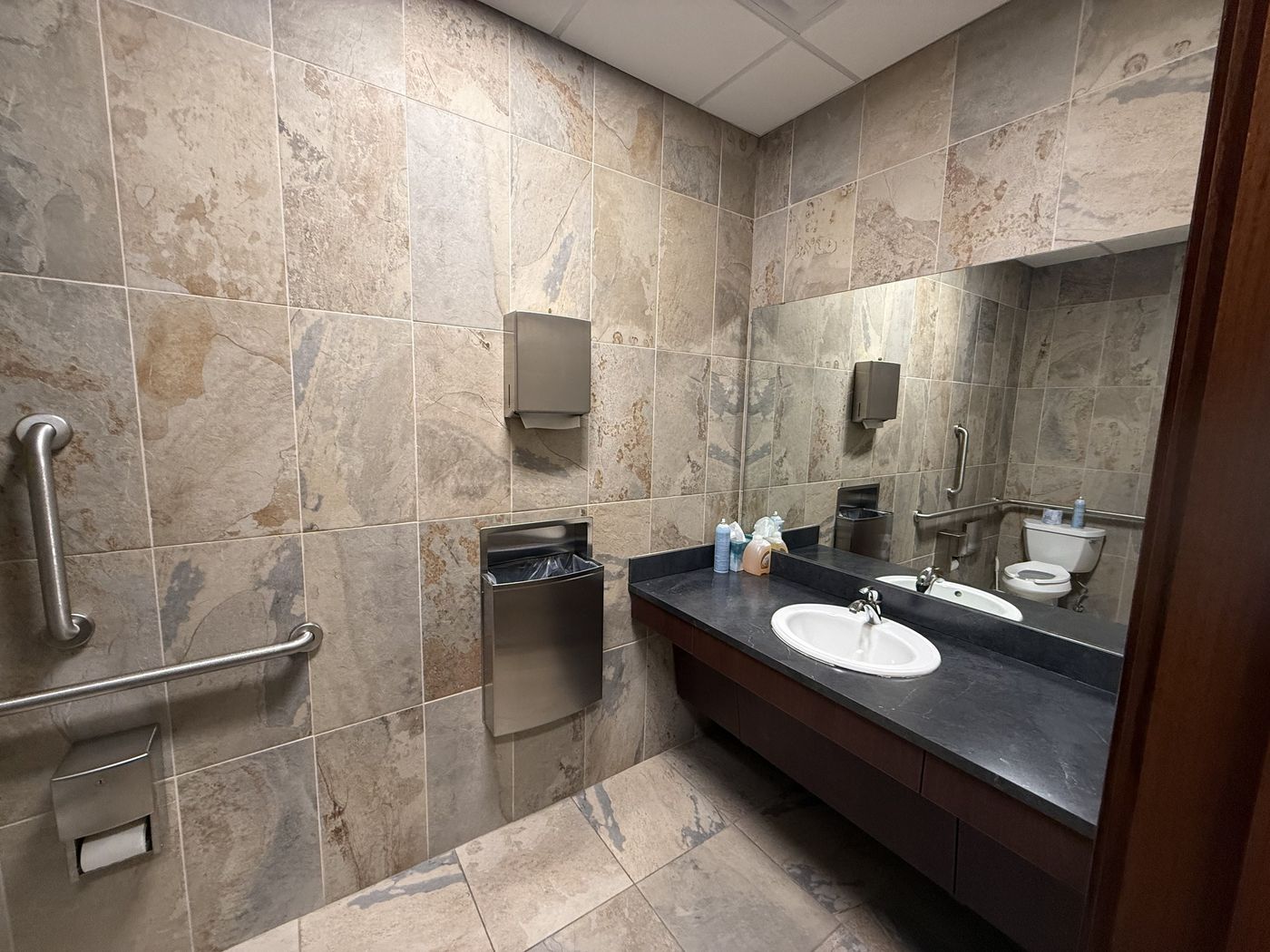 Commercial restroom, cleaned and restocked